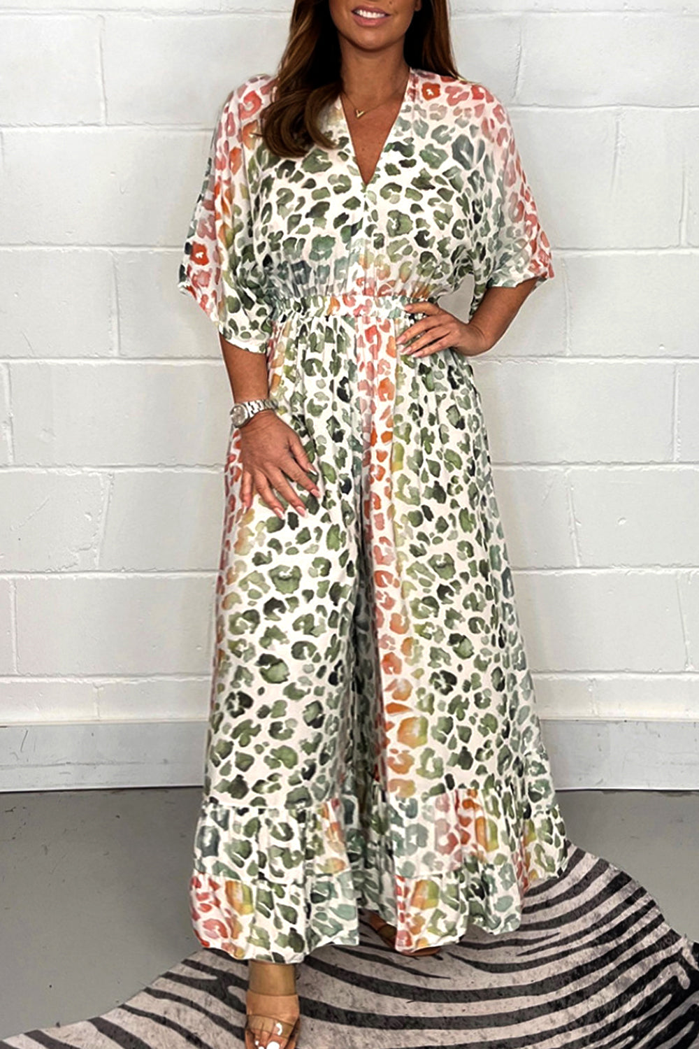 Dámská kombinéza s dlouhým vysokým pasem s potištěným výstřihem do V